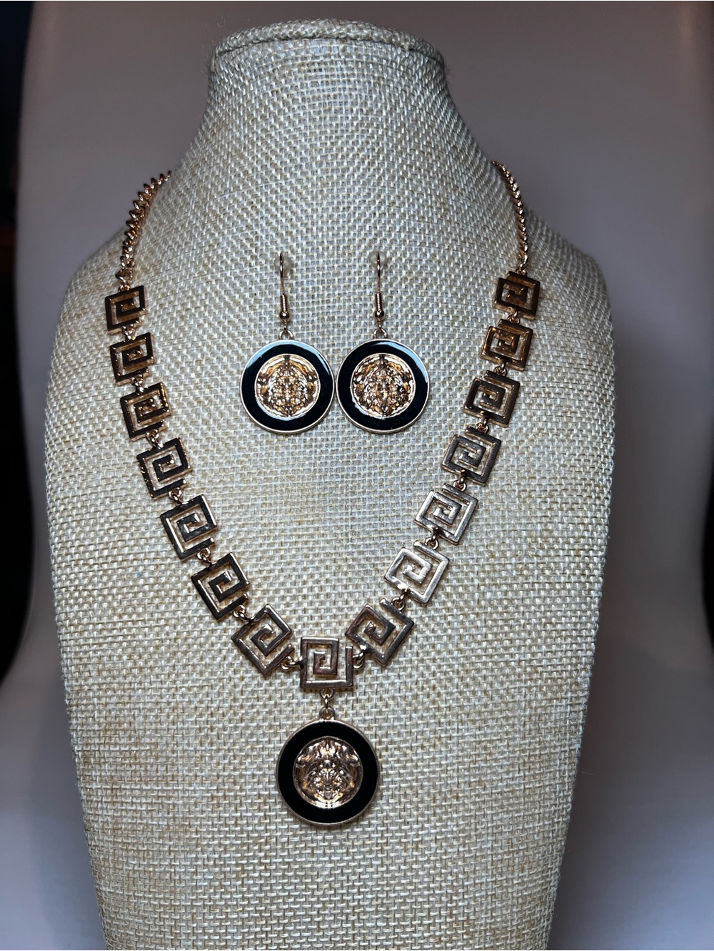 Embosed medusa gold tone and enamel chain necklace and earring set NEW